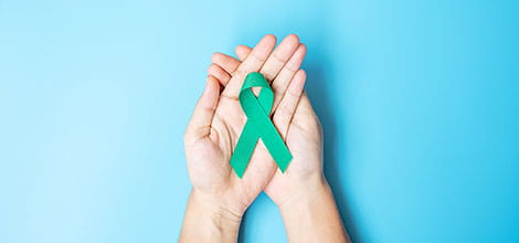Ovarian cancer hands ribbon